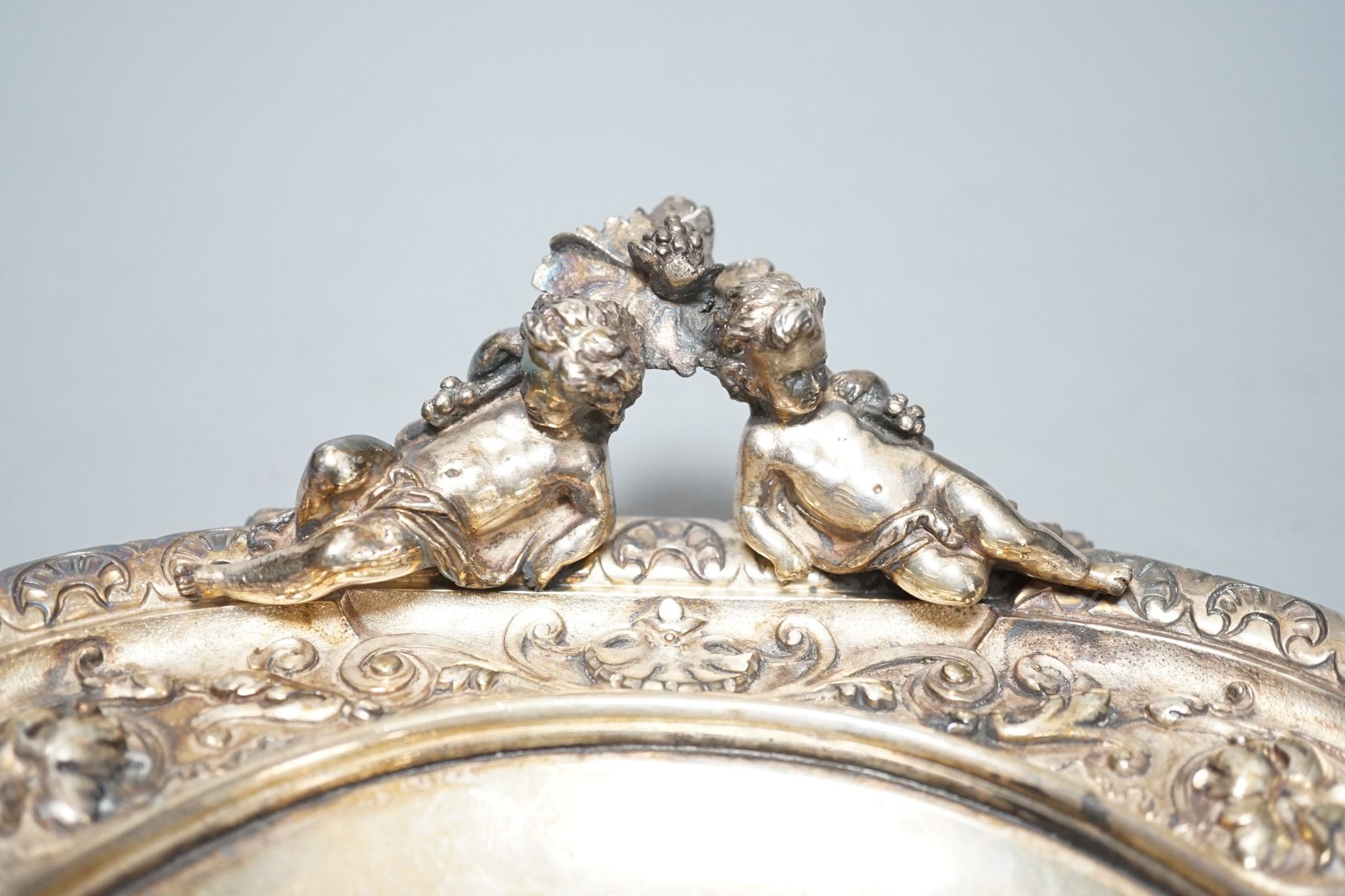 A Victorian cherub handled plated tray 40cm